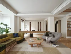 A modern living room featuring wooden furniture and velvet sofas.
