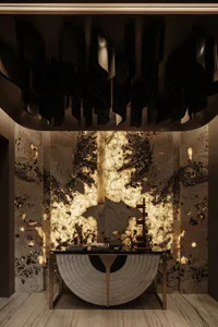 Modern interior design featuring a marble and metal table with a textured wall behind it.