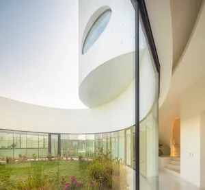 Modern living room with large glass windows