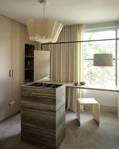 Modern interior space featuring a wooden desk and workstation
