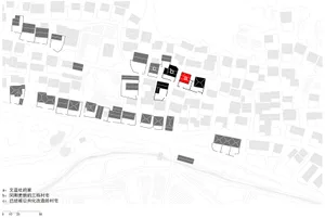 A black and white urban development plan with various buildings and areas marked, including a home, renovated buildings, and 