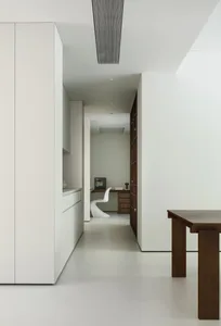 A modern interior with white walls and minimalist design.