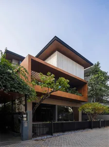 Modern building featuring a metal and concrete exterior.