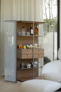 A modern display cabinet made of wood and glass.
