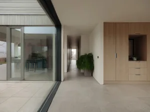 Modern minimalist residential interior with wood, glass, concrete, and terrazzo materials, featuring natural lighting and sle