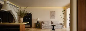A minimalist living room with neutral-toned decor and a modern design.