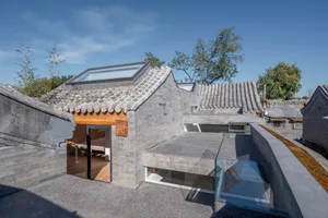 Modern residential outdoor area featuring concrete materials and a contemporary design.
