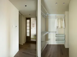 A modern closet interior featuring metal wire shelving for clothing storage
