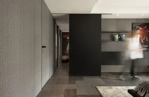 A modern residential interior featuring textured materials and minimalist design.