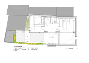 Modern architectural floor plan with concrete materials in a residential setting.