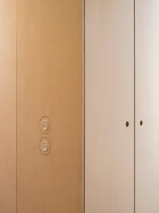 Comparison of natural wood and plywood panels in interior design