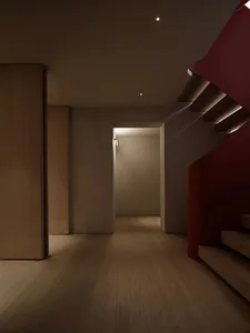 Modern interior design featuring timber stairs and corridor.