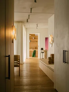 Modern minimalist interior design with wooden walls and furniture.
