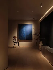 A modern interior design featuring contemporary wooden panels in a living room setting.