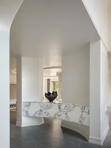 A modern living room featuring a marble floor.