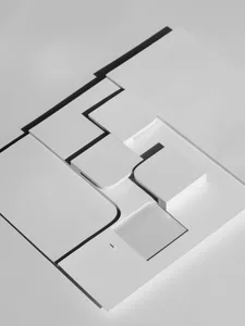 Minimalist architectural design represented by cut-out paper shapes