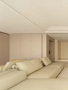 Modern living room featuring a large leather sofa.