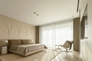 A modern bedroom with neutral-toned textiles and fabrics, highlighting minimalist design elements and a serene, sophisticated