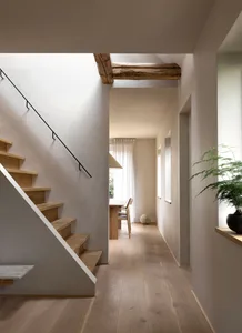 A modern interior design featuring hardwood flooring and minimalistic decor.