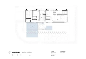 Floor plan of a residential house showing bedrooms, bathrooms, and living areas.