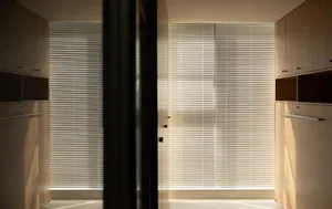 Modern minimalist wardrobe with wooden and metal materials.