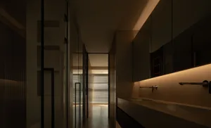 A minimalist bathroom with glass walls