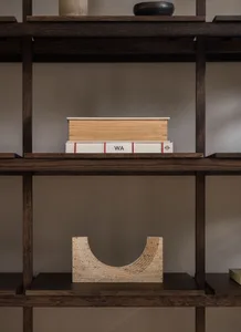 A modern wooden bookshelf with minimalist design