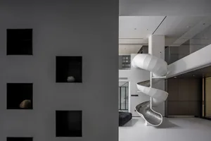 Modern interior design featuring sleek concrete elements and minimalist aesthetics.