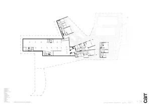 A detailed black and white architectural floor plan of a building's basement level, showing various rooms and spaces.