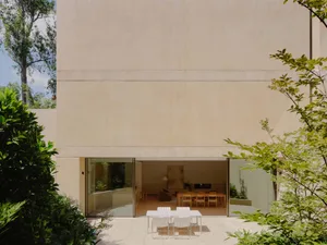 Modern interior design featuring concrete walls and floors.