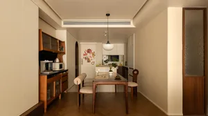 A contemporary residential interior featuring minimalist design principles with modern materials and furniture.