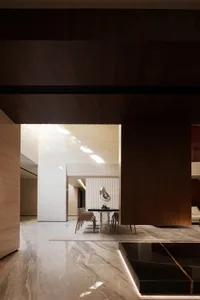 Modern dining room with marble, concrete, and wood materials