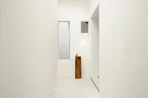 Modern interior with granite flooring, minimalist design elements.