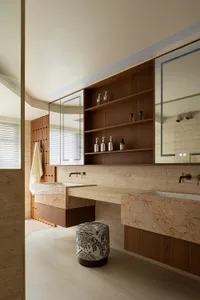 Modern minimalist bathroom designed with marble finishes and contemporary fixtures.