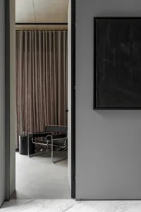 Modern interior design with black furniture and lighting