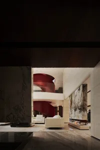 Modern interior with marble flooring and stairs.