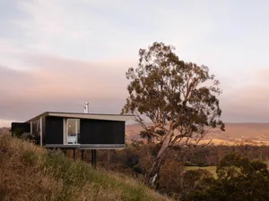 Modern residential architecture with metal and glass materials.