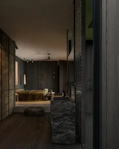 A minimalist bedroom featuring dark wooden paneling and concrete bathroom elements.