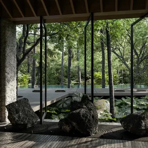 A minimalist landscape design featuring natural stone elements.