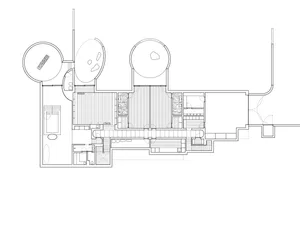 Floor plan of a modern residential building with wooden flooring.