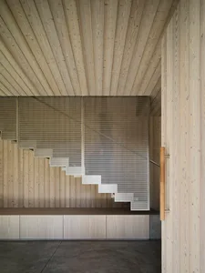 Industrial-style interior with a metallic staircase