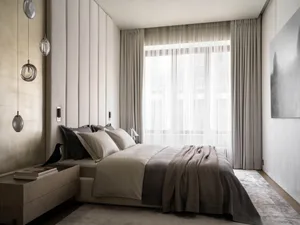 Modern and minimalist bedroom with contemporary materials and design.