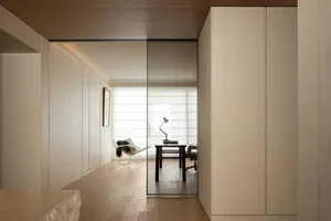 Modern office space featuring white cabinets and neutral color palette