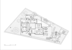 Floor plan of a house showing interior spaces and layout.