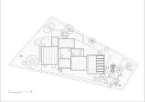 Floor plan of a residential house showing various rooms and outdoor spaces.
