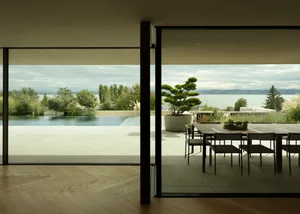 A modern, minimalist house with a wooden exterior featuring large windows.