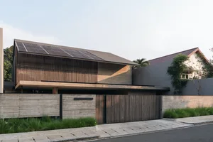 Modern residential house with concrete and wood exterior materials