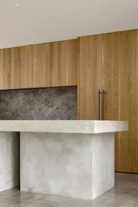 Modern kitchen featuring concrete and wood elements