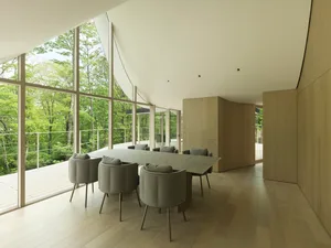 Modern residential interior featuring wood and glass materials.