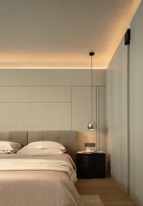 A minimalist bedroom with beige-colored furniture and materials, featuring a bed with a beige headboard and beige bedding, a
